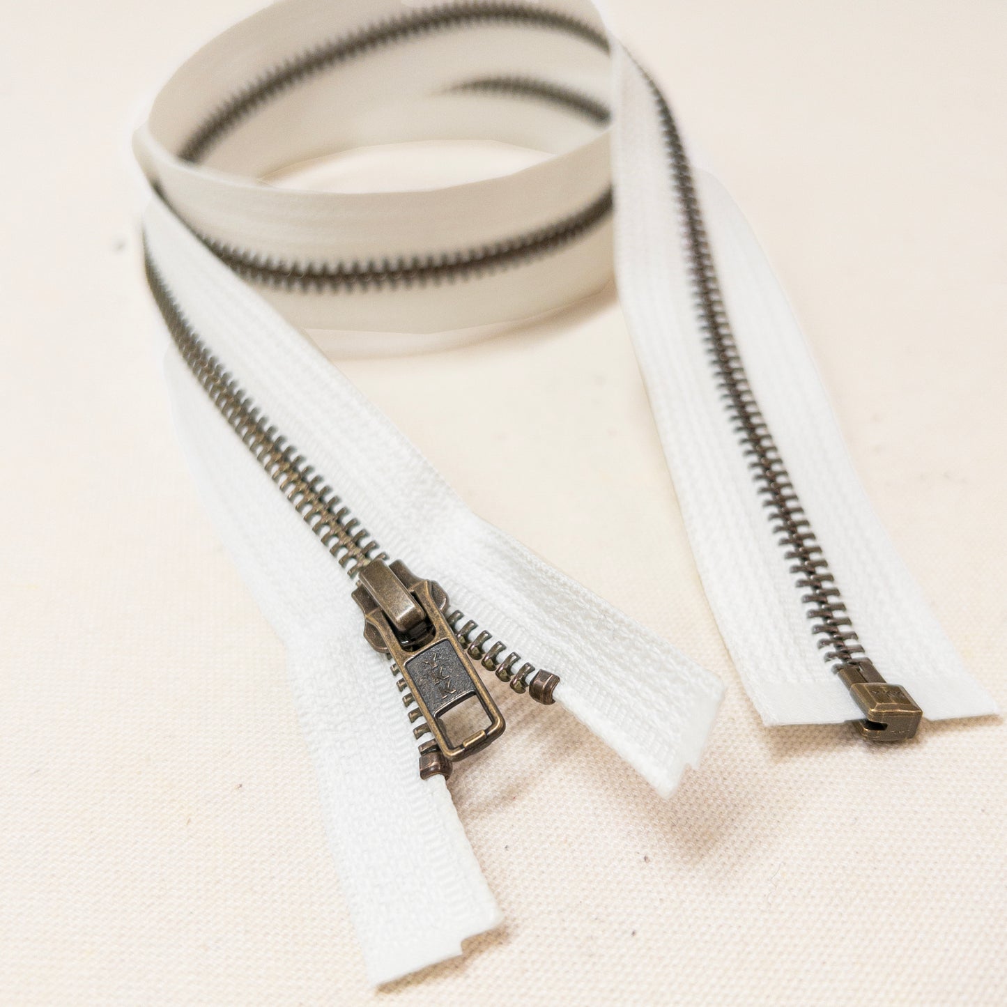 30" Separating Zipper in Antique Brass