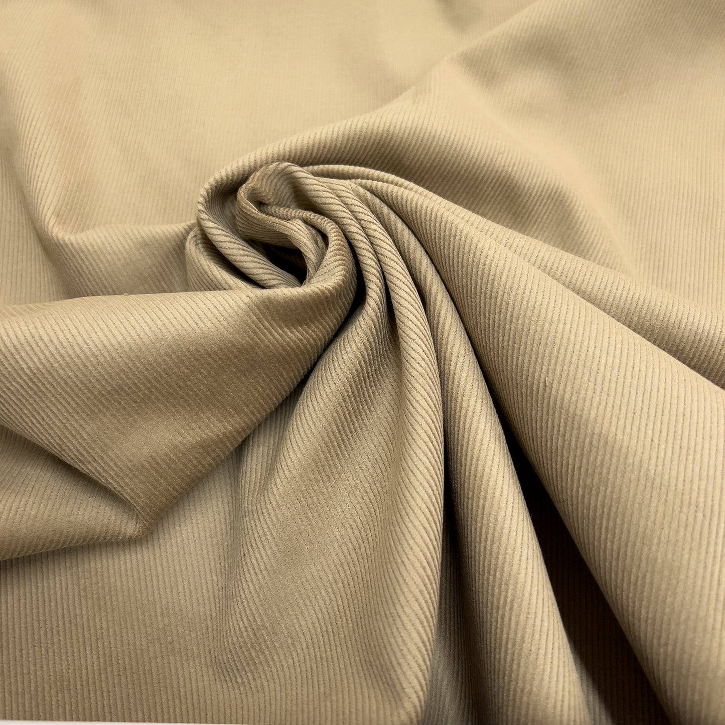 14 wale corduroy twisted like a flower to show fabric rigidness.