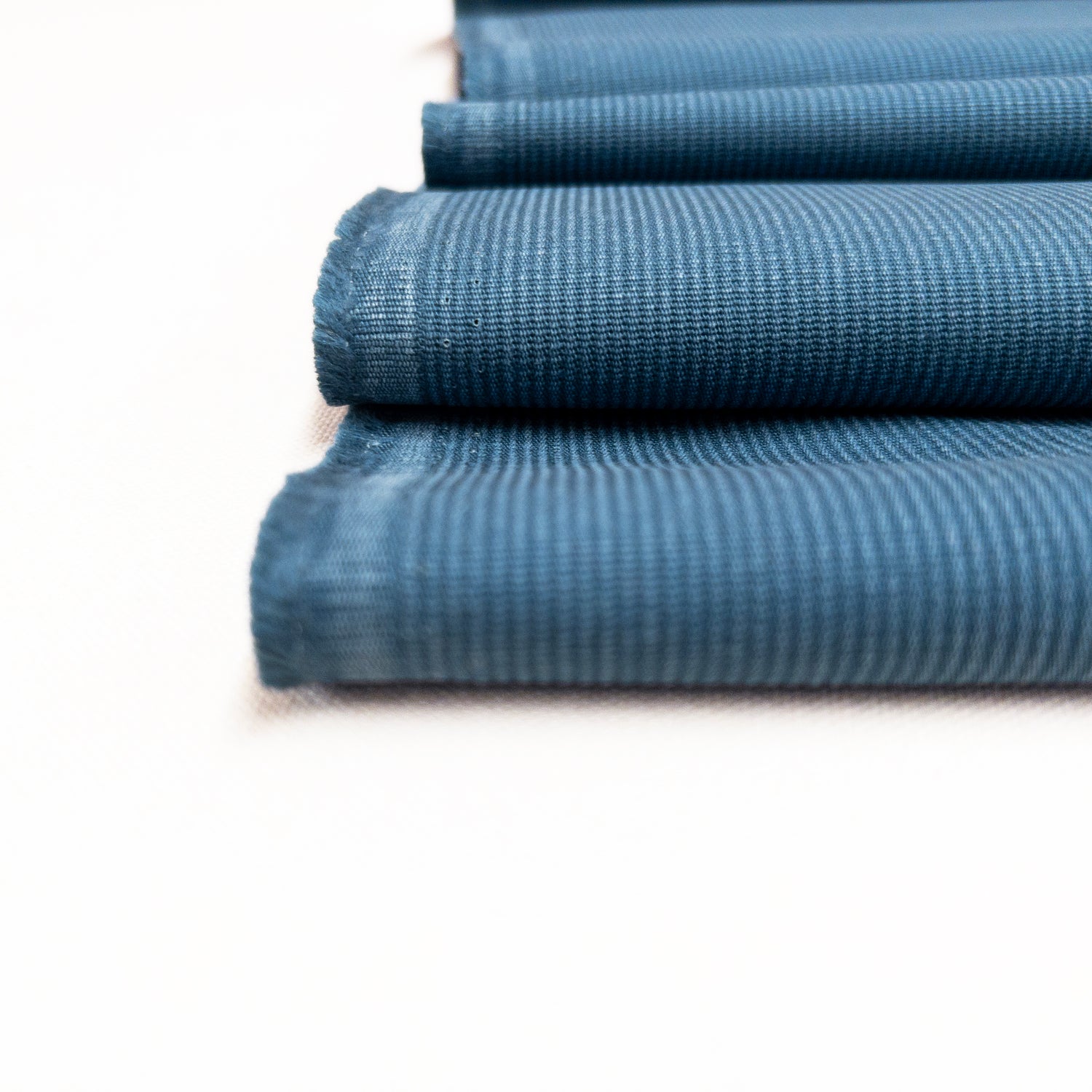 Close up view of our bedford cord heavy weight fabric shows fine raised ribs on fabric face.