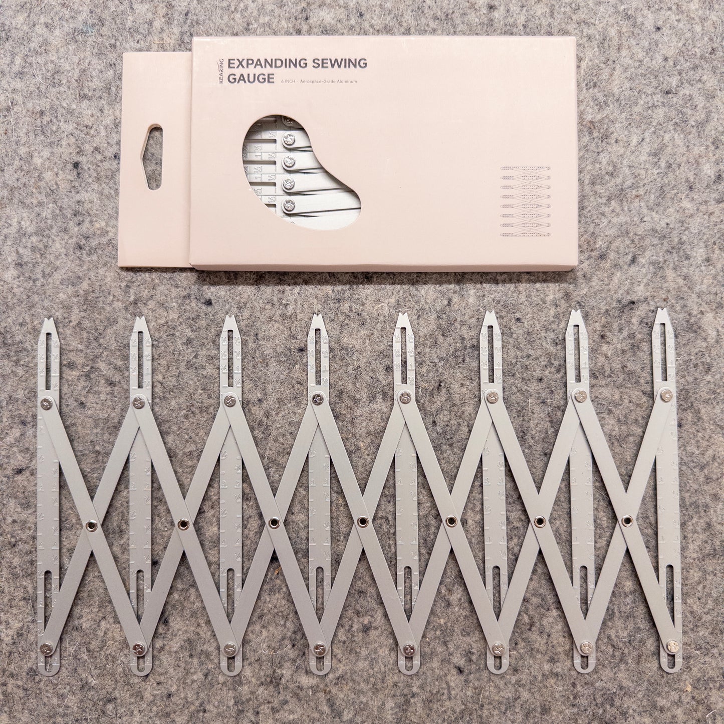 Button Expanding Gauge in Silver