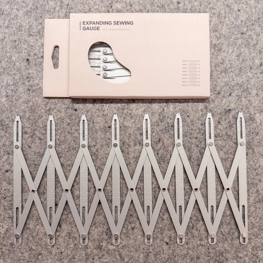 Button Expanding Gauge in Silver