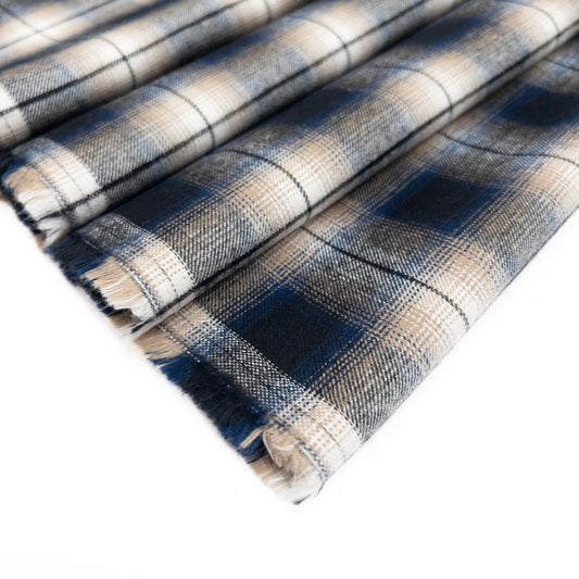 Quality fabric cotton flannel in blue shown folded.