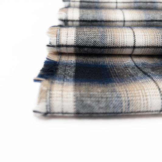 100% cotton flannel garment fabric shown folded in a close up view.