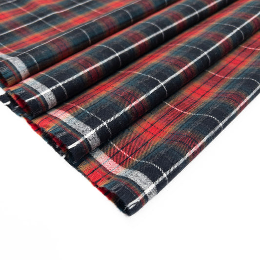 100% cotton flannel quality garment fabric in plaid shown folded.