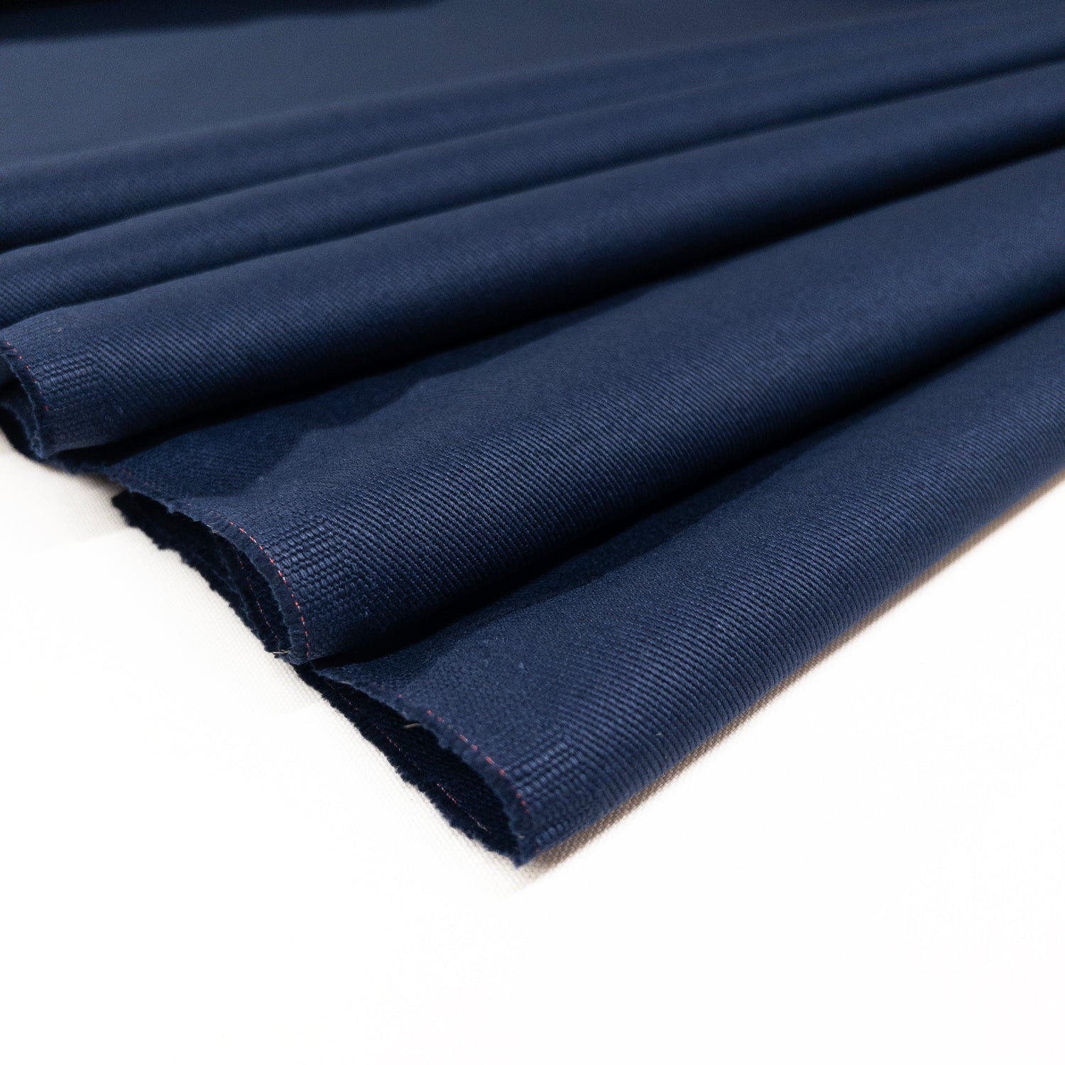 Heavy cotton twill in blue shown folded