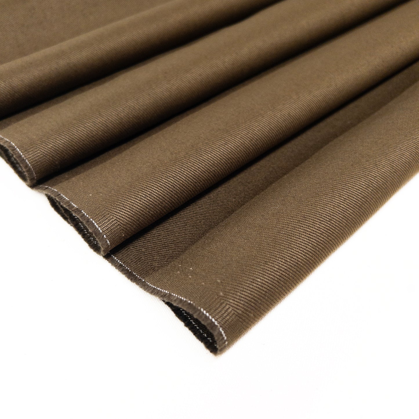 Olive green 100% cotton twill garment fabric shown folded