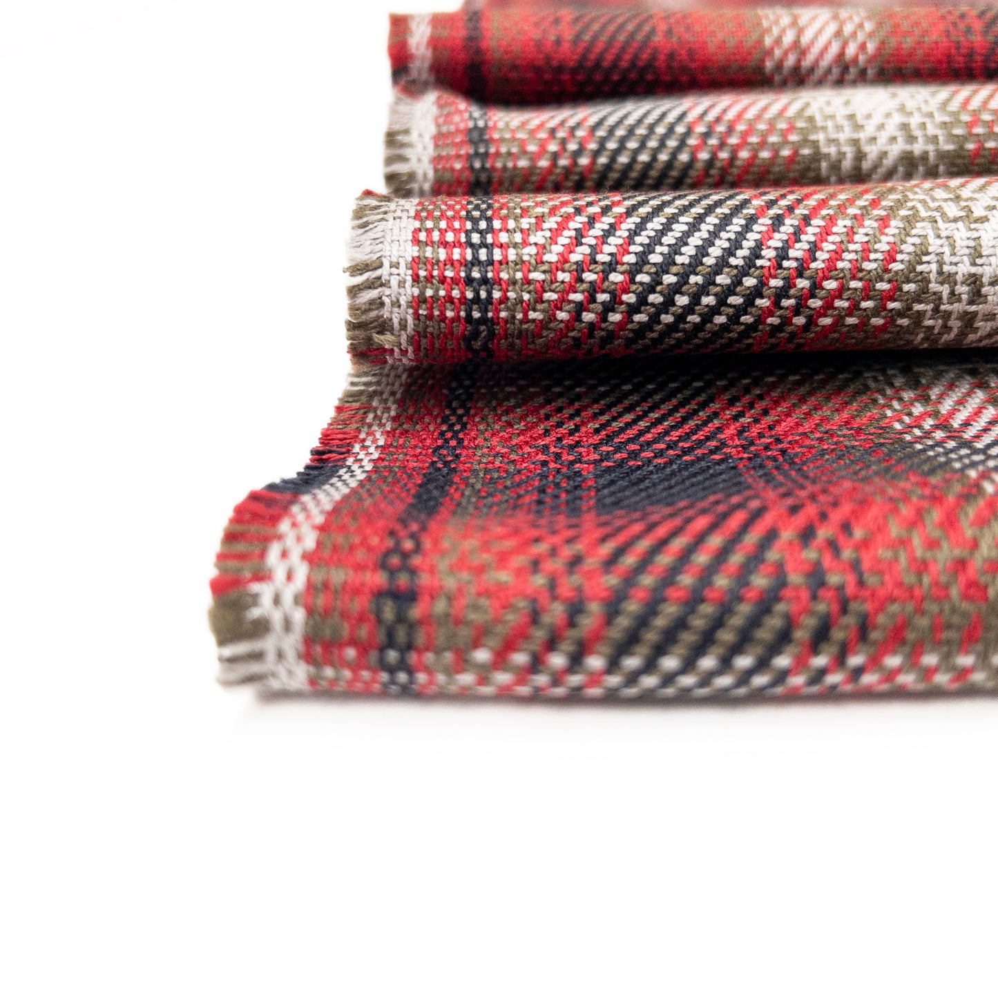 Detail view of red, black and grey tartan plaid in a twill weave.