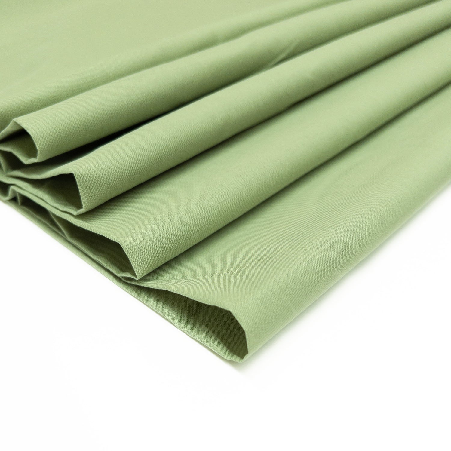 100% cotton voile fabric in an herb green hue shown from above folded over itsef