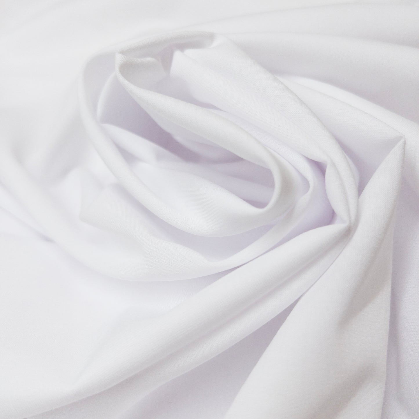 Bright white very lightweight cotton fabric is a spiral.